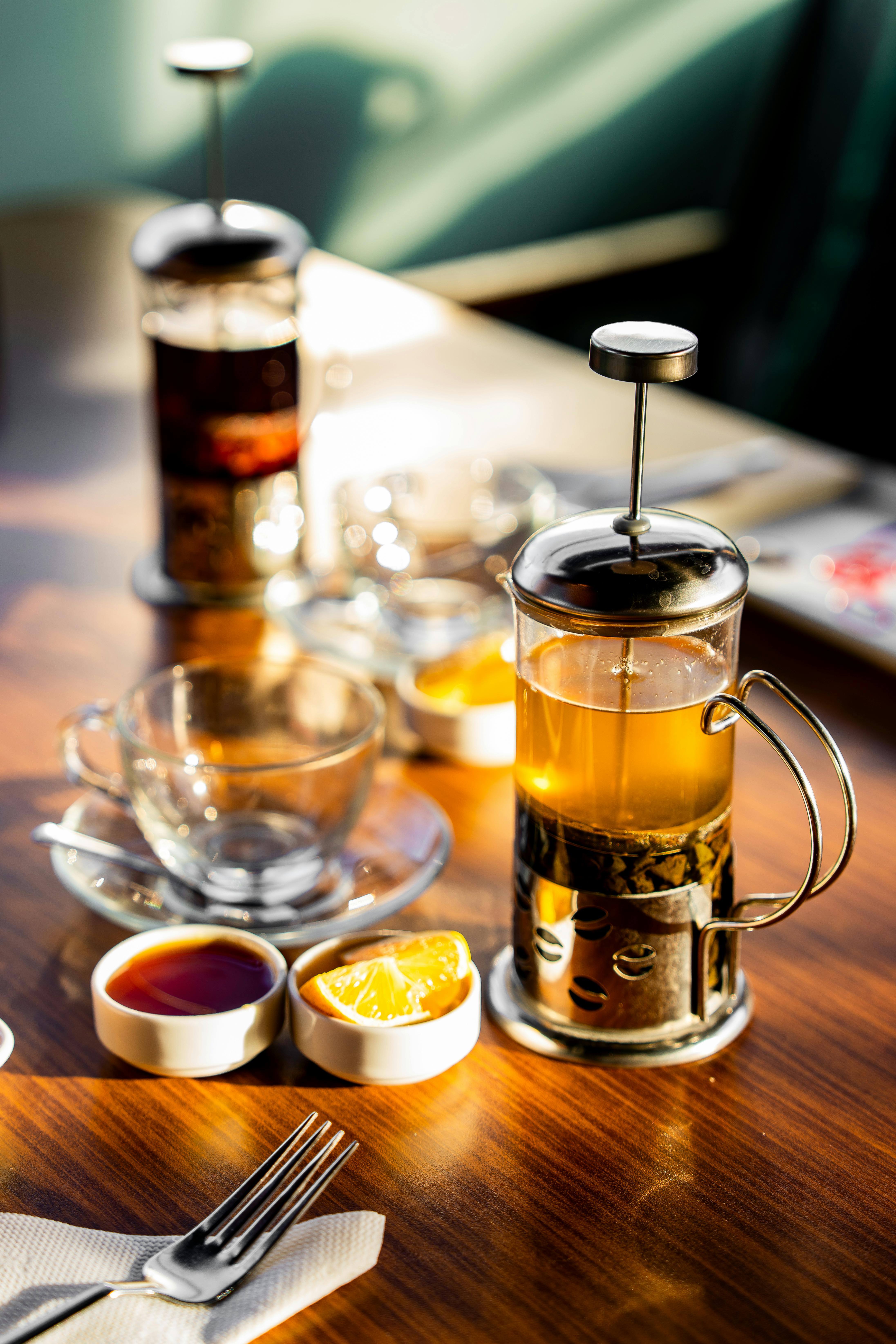 French press coffee being poured into a cup